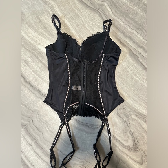 Black mesh and lace corset top with white lace trim
Size 36B - Picture 2 of 3